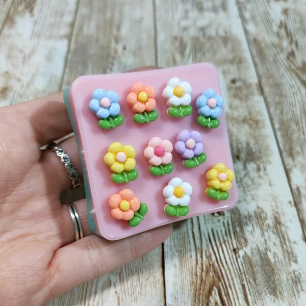 Stampo Fiorellini 10pz 15mm in silicone per creazioni in resina, gesso, sapone, cera e paste polimeriche - immagine 3