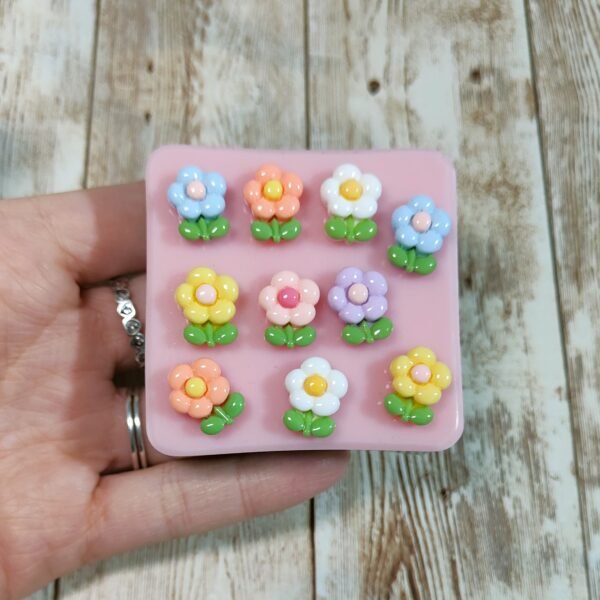 Stampo Fiorellini 10pz 15mm in silicone per creazioni in resina, gesso, sapone, cera e paste polimeriche - immagine 4
