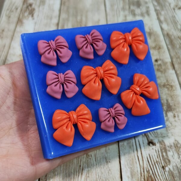 Stampo Fiocchetti 8pz 2-3cm in silicone per creazioni in resina, gesso, sapone, cera e paste polimeriche - immagine 3