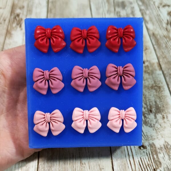 Stampo Fiocchi 9pz 2cm in silicone per creazioni in resina, gesso, sapone, cera e paste polimeriche - immagine 4
