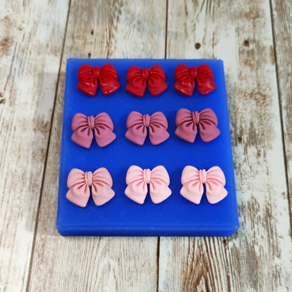 Stampo Fiocchi 9pz 2cm in silicone per creazioni in resina, gesso, sapone, cera e paste polimeriche - immagine 5