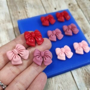 Stampo Fiocchi 9pz 2cm in silicone per creazioni in resina, gesso, sapone, cera e paste polimeriche