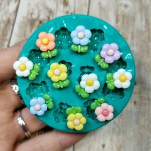 Stampo Fiorellini 10pz 15mm in silicone per creazioni in resina, gesso, sapone, cera e paste polimeriche