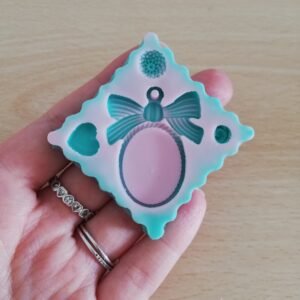 Stampo Base Cameo con fiocco in silicone per creazioni in resina e fimo